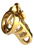 Cage de chasteté masculine dorée avec cadenas. Accessoire de plaisir et de contrôle. Explorez de nouvelles sensations. Sécurité et élégance.; Gouden kuisheidskooi voor mannen met slot. Plezier en controle accessoire. Ontdek nieuwe sensaties. Veiligheid en elegantie.; Gold male chastity cage with lock. Pleasure and control accessory. Explore new sensations. Security and elegance.