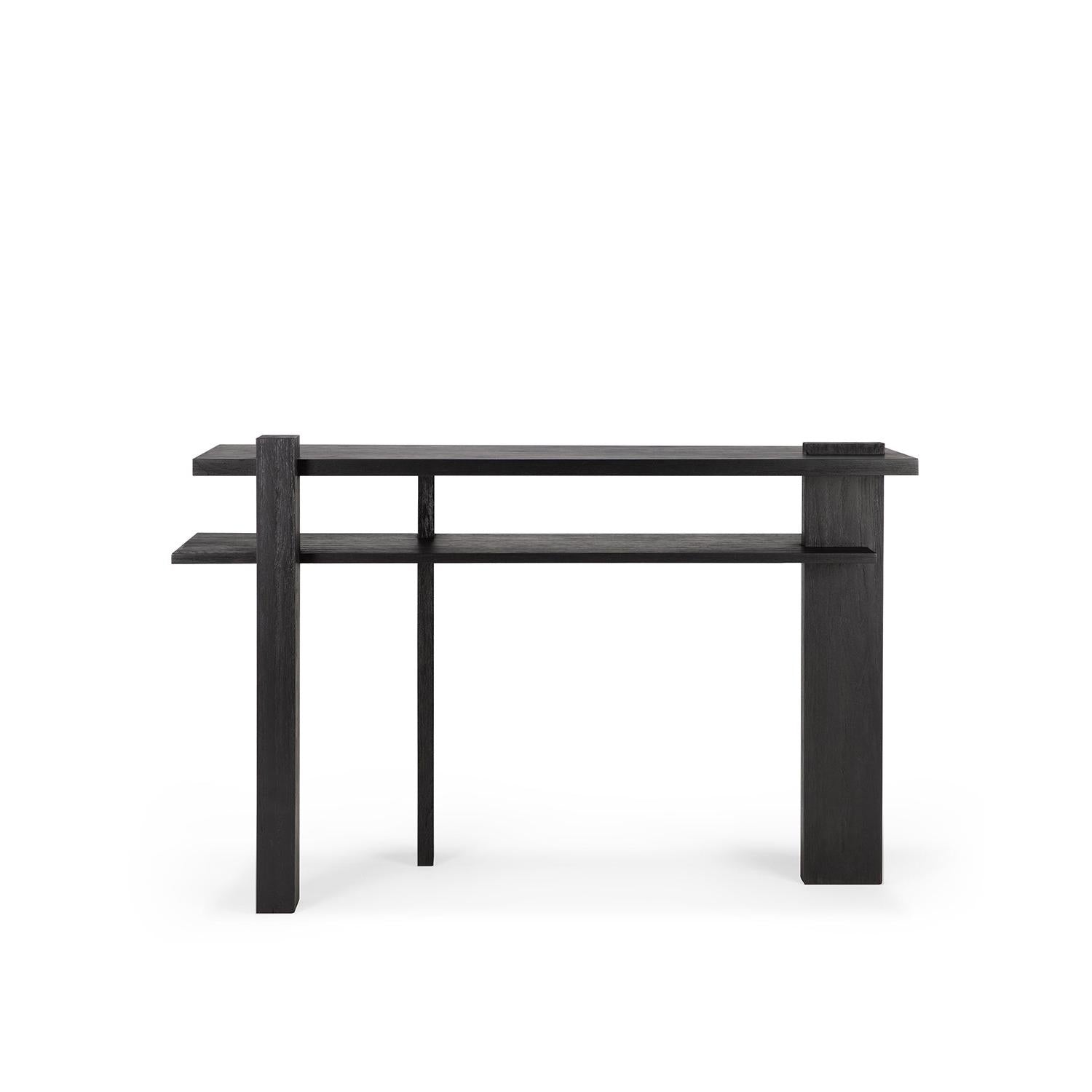 The Abstract Console by Ethnicraft is a modern black wooden table with clean geometric lines, an asymmetrical de Stijl-inspired design, two rectangular shelves, and unique vertical and horizontal supports. Shown on a plain white background.