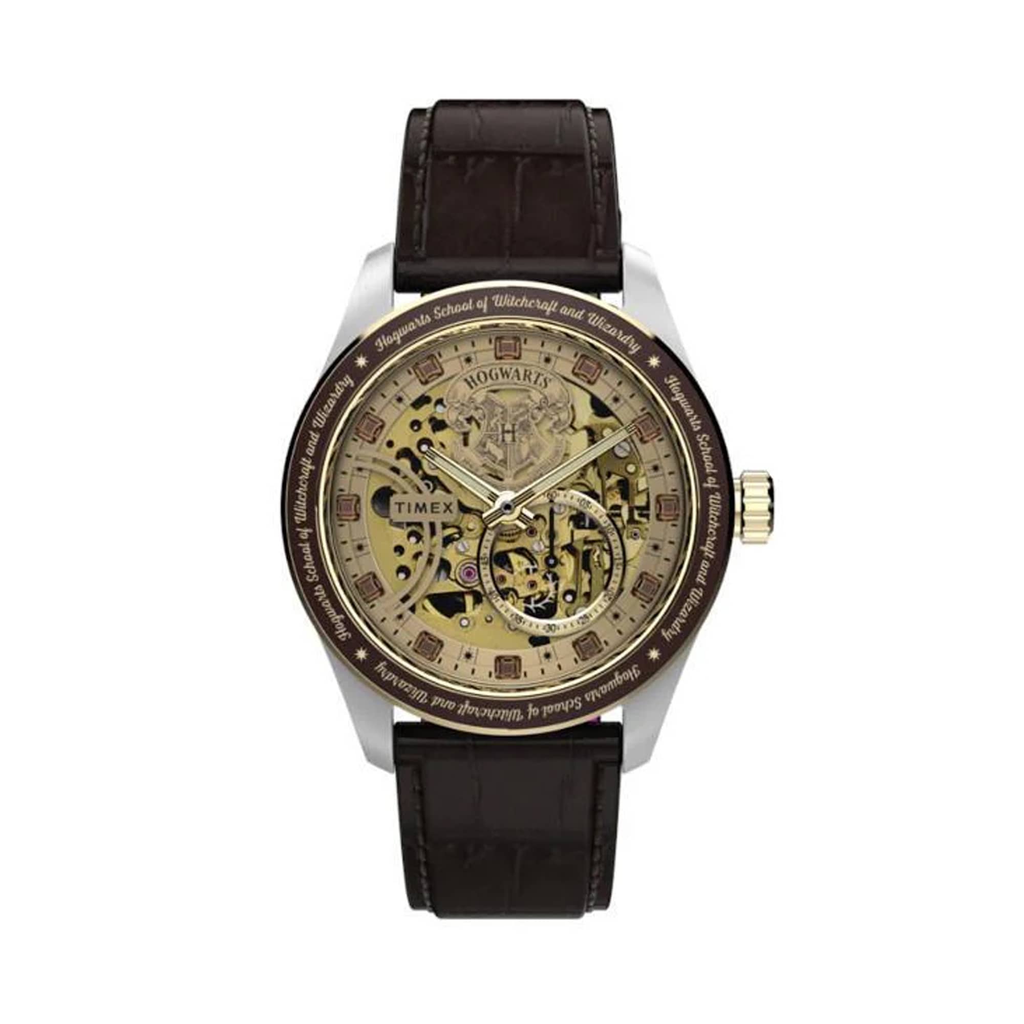 The Timex x Harry Potter Waterbury Skeleton Automatic TW2Y75500 features a gold skeletonized dial revealing the movement, with brown faceted crystals marking the hours. The Hogwarts crest sits at 12 o'clock.