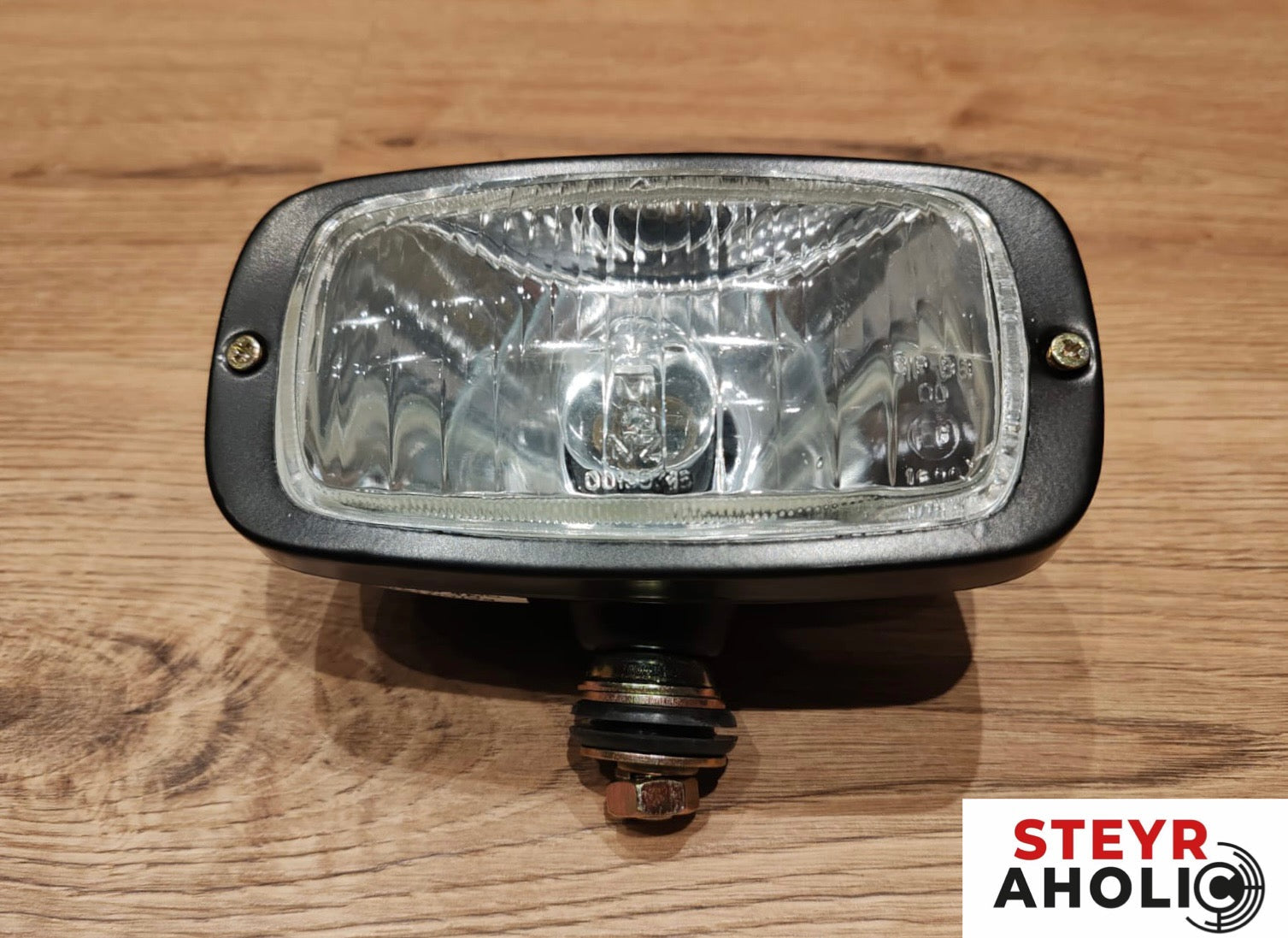 Hauptscheinwerfer zu Steyr Plus 1-34-772-084