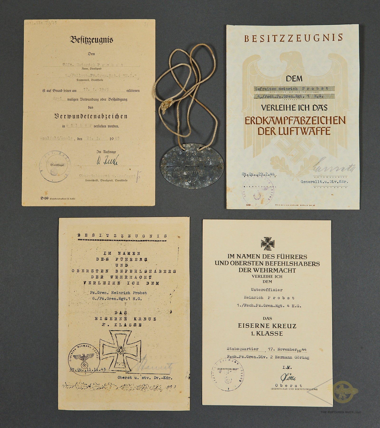 Desirable Paratrooper Document Grouping of Knight's Cross Recipient and Hermann Göring Division Member Unteroffizier Heinrich "Heinz" Probst