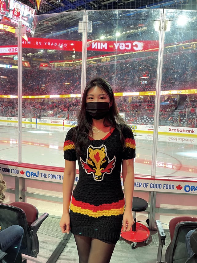 Any hockey fans here? It's not perfectly finished but I made myself a Flames jersey dress! I did crochet for the whole dress and embroider for the Blasty logo ☺️ : r/crochet