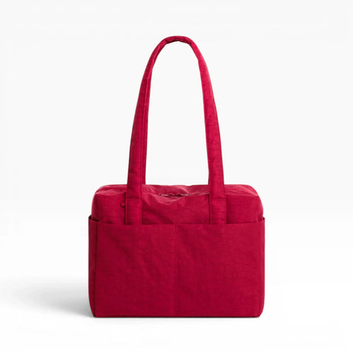 Cherry red tote bag with long handles and quilted front panels