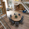 DC101 Deco Frozen Umber engineered wood flooring with a round wooden dining table and white orchids