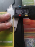 how long measure a perfect border of pokemon cards? Just curious, I don't grade nor do I like graded cards. I measured with a calliper those that I think are centered and