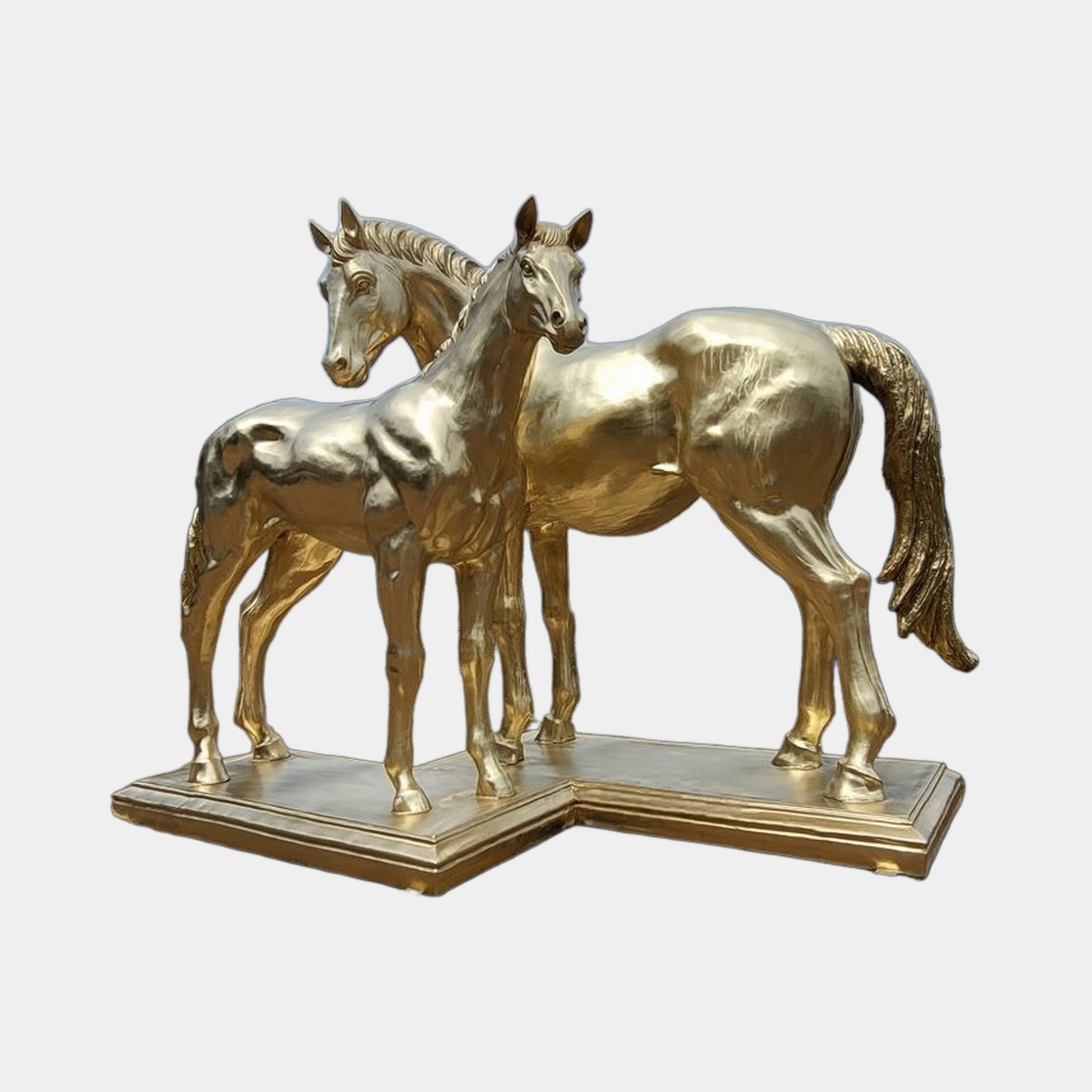 Monumental Mare and Foal Bronze Sculpture by Giant Sculptures in polished gold finish, two horses side by side on a shared chamfered plinth, plain background.